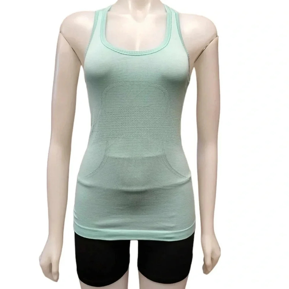 Lululemon Women's Swiftly Tech Racerback Heathered
Blue Green Size 4